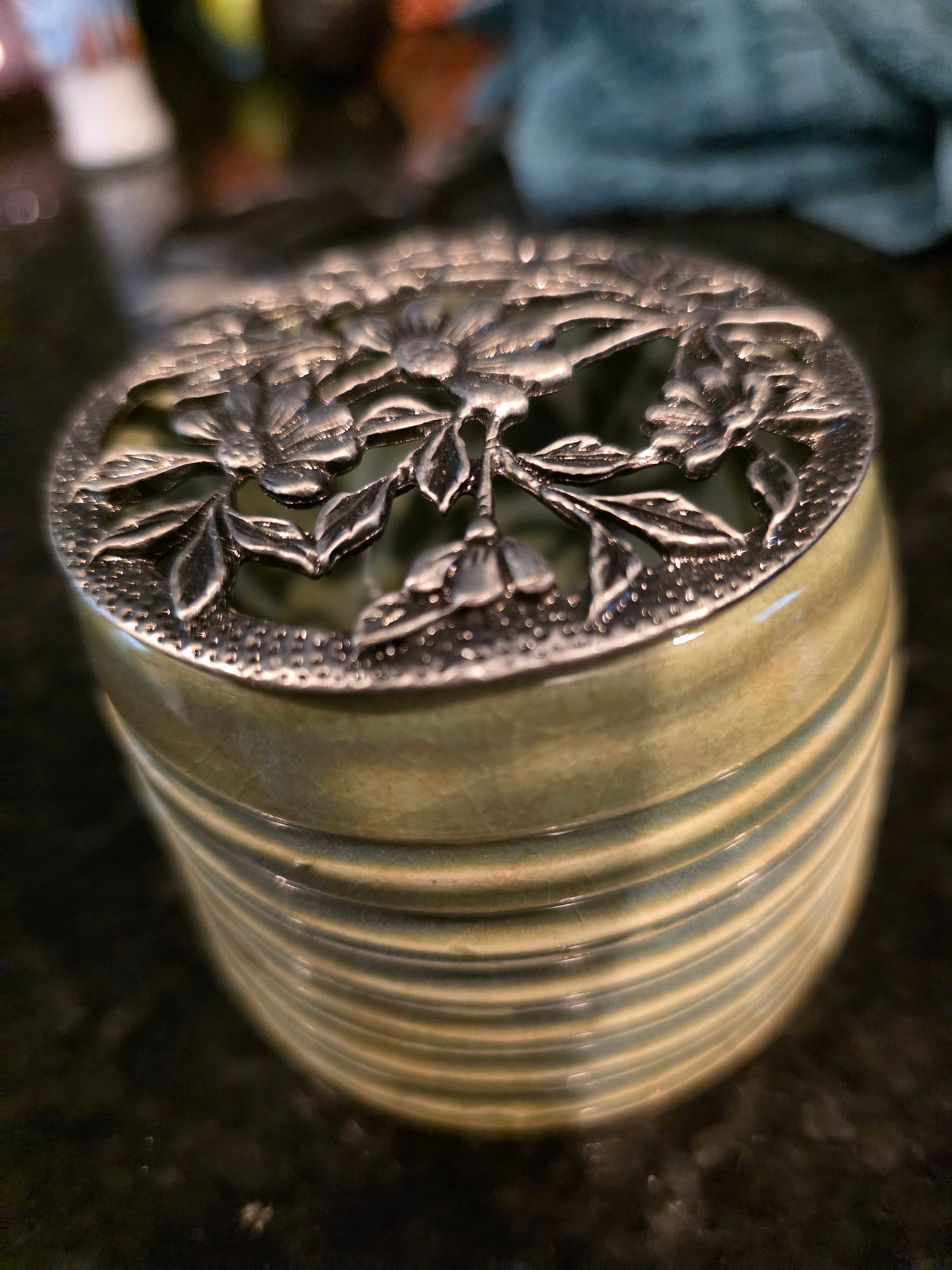 Sage Green Pottery Jar with Pierced Floral Metal Lid – Handmade Wheel-Thrown Stoneware