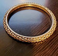 Vintage 1970s Gold Toned Bangle Bracelet: Retro Statement Jewelry