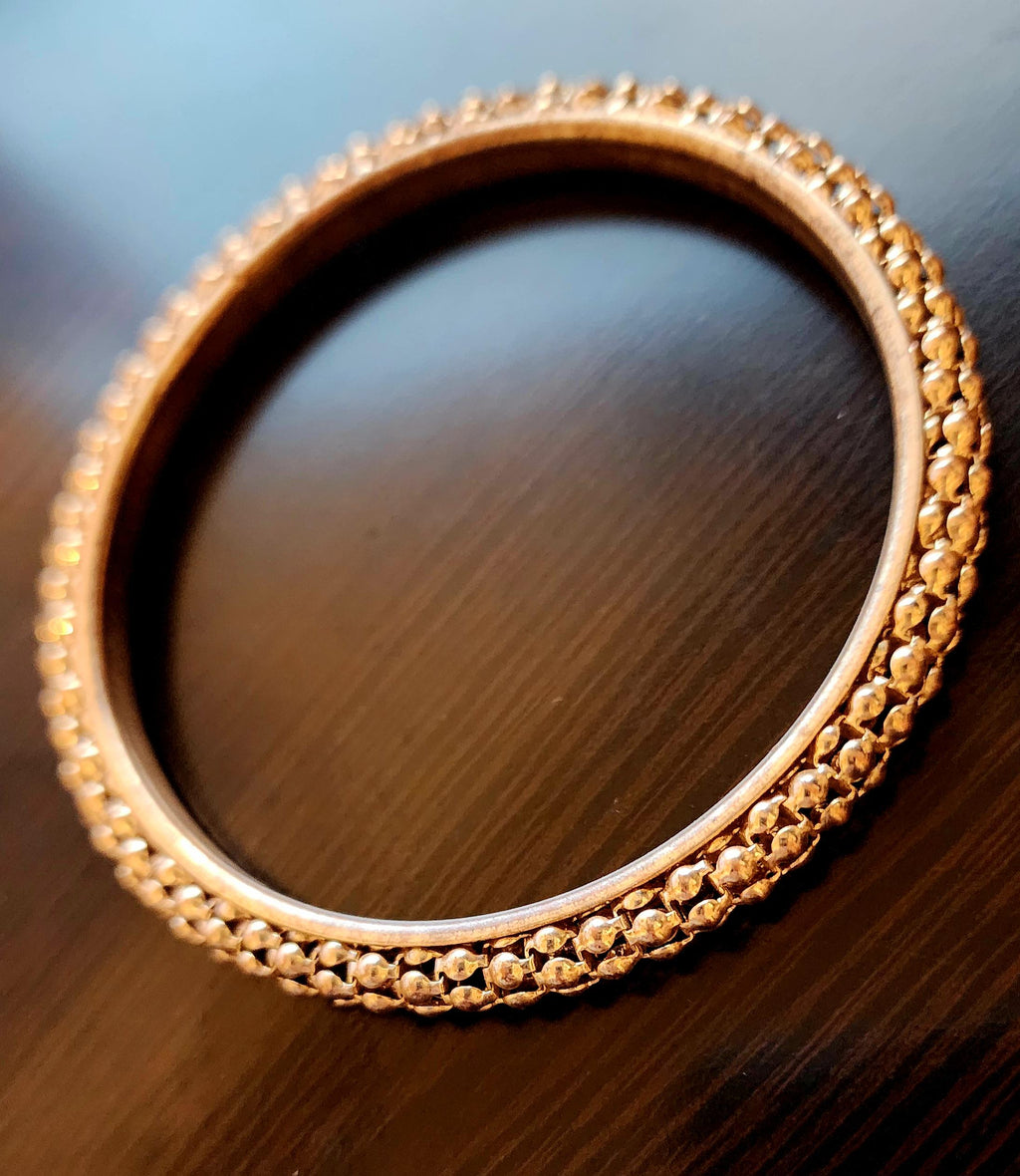 Vintage 1970s Gold Toned Bangle Bracelet: Retro Statement Jewelry