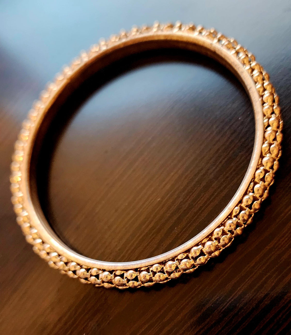 Vintage 1970s Gold Toned Bangle Bracelet: Retro Statement Jewelry