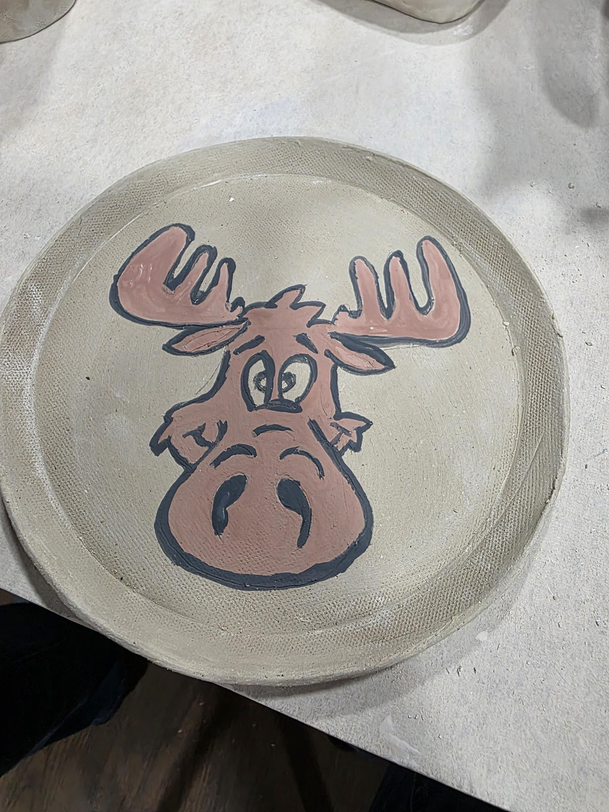Custom hand-painted moose plate by Outer Reef Ceramics