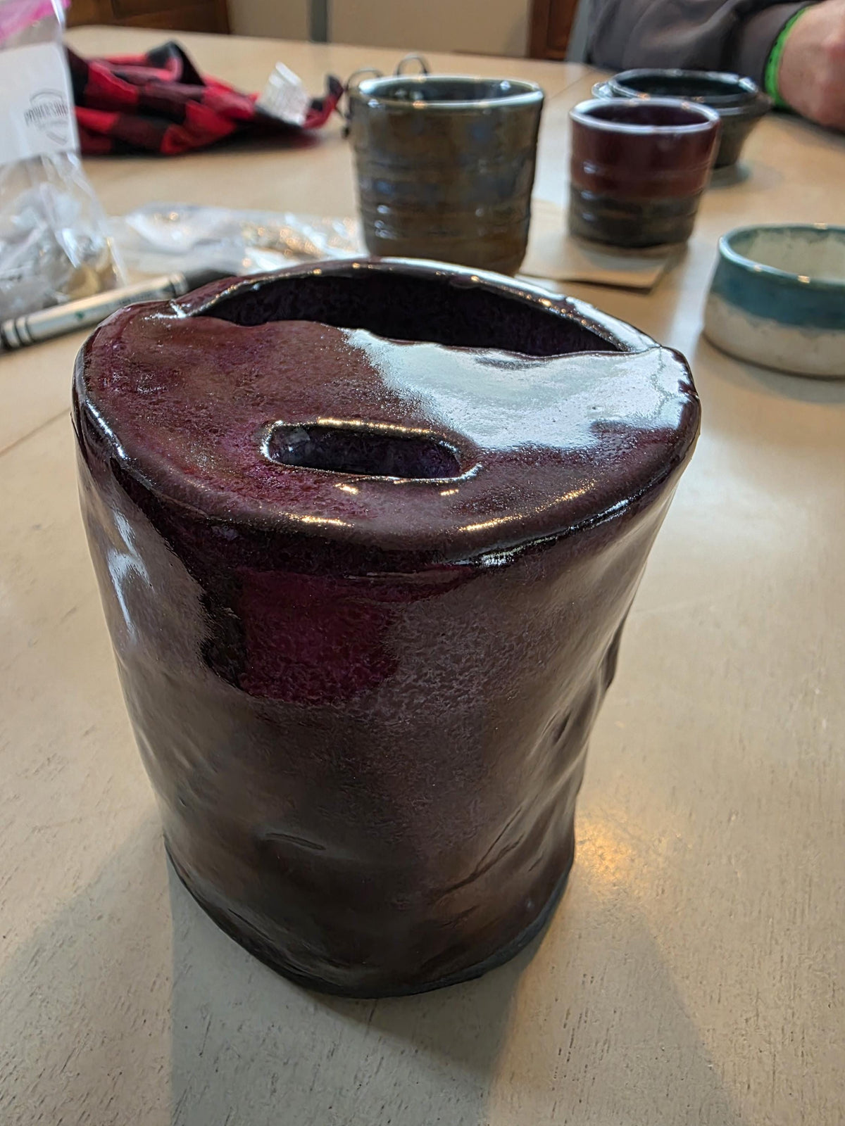 Handmade stoneware travel mug with lid by Outer Reef Ceramics