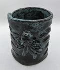 Octopus mug in black clay, handmade by Outer Reef Ceramics