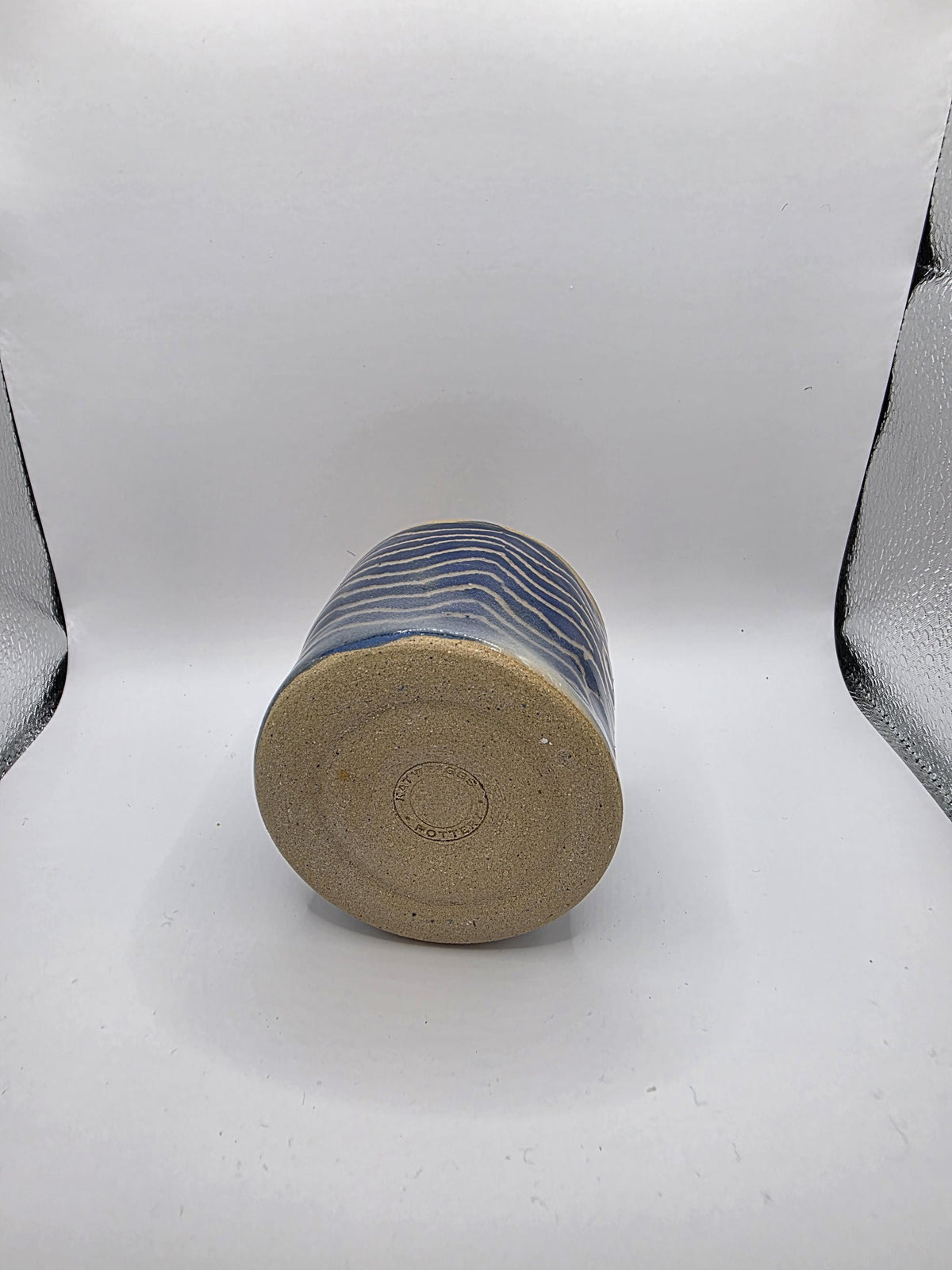 Carved whale tumbler, handmade by Outer Reef Ceramics