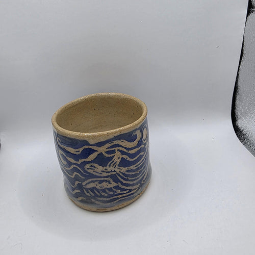 Carved whale tumbler, handmade by Outer Reef Ceramics