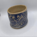 Carved whale tumbler, handmade by Outer Reef Ceramics