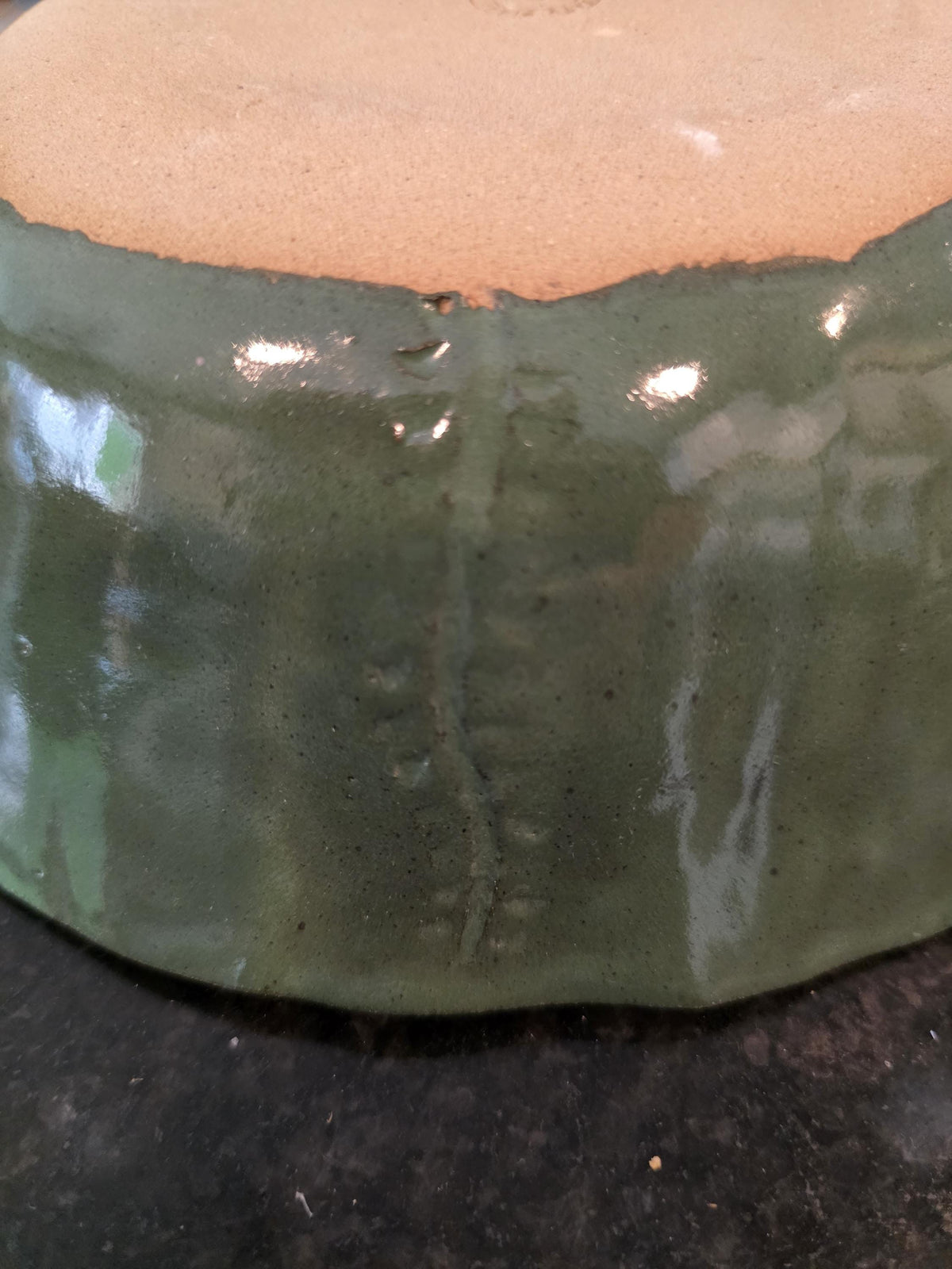 Carved leaf serving bowl in sage green, handmade by Outer Reef Ceramics